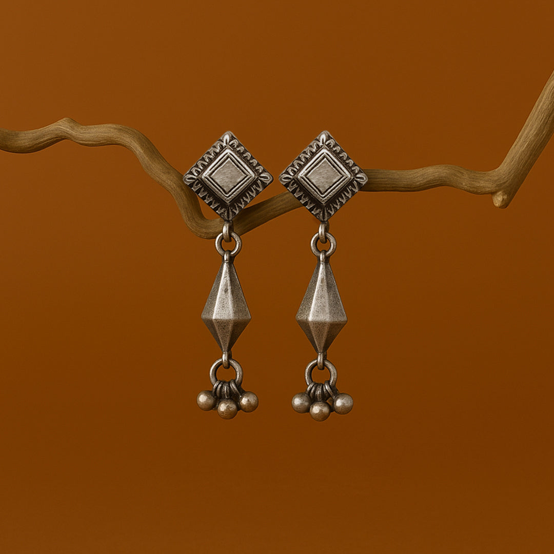 Taveez Handcrafted Stamped Silver Earrings with Ghungroos