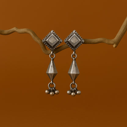 Taveez Handcrafted Stamped Silver Earrings with Ghungroos