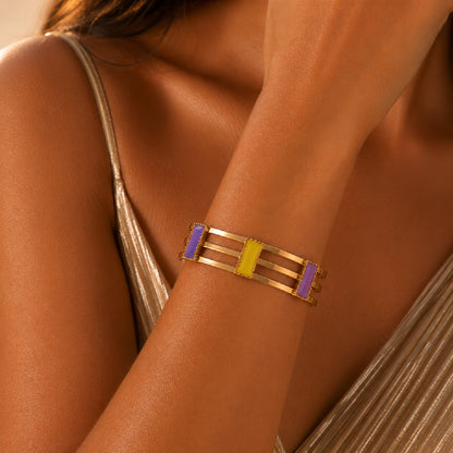 Deco Mosaic 18K gold-plated cuff bracelet in lilac and citrus yellow enamel worn with a matte gold Indian sari — evening wear model shot — Studio Anivarya